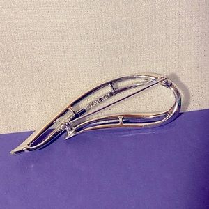 Silver tone pin by Sarah Coventry, 1958